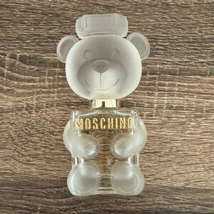 Moschino Bear-Shaped Frosted Glass Bottle with Gold Accents